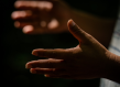 A person’s open hand inviting dialogue